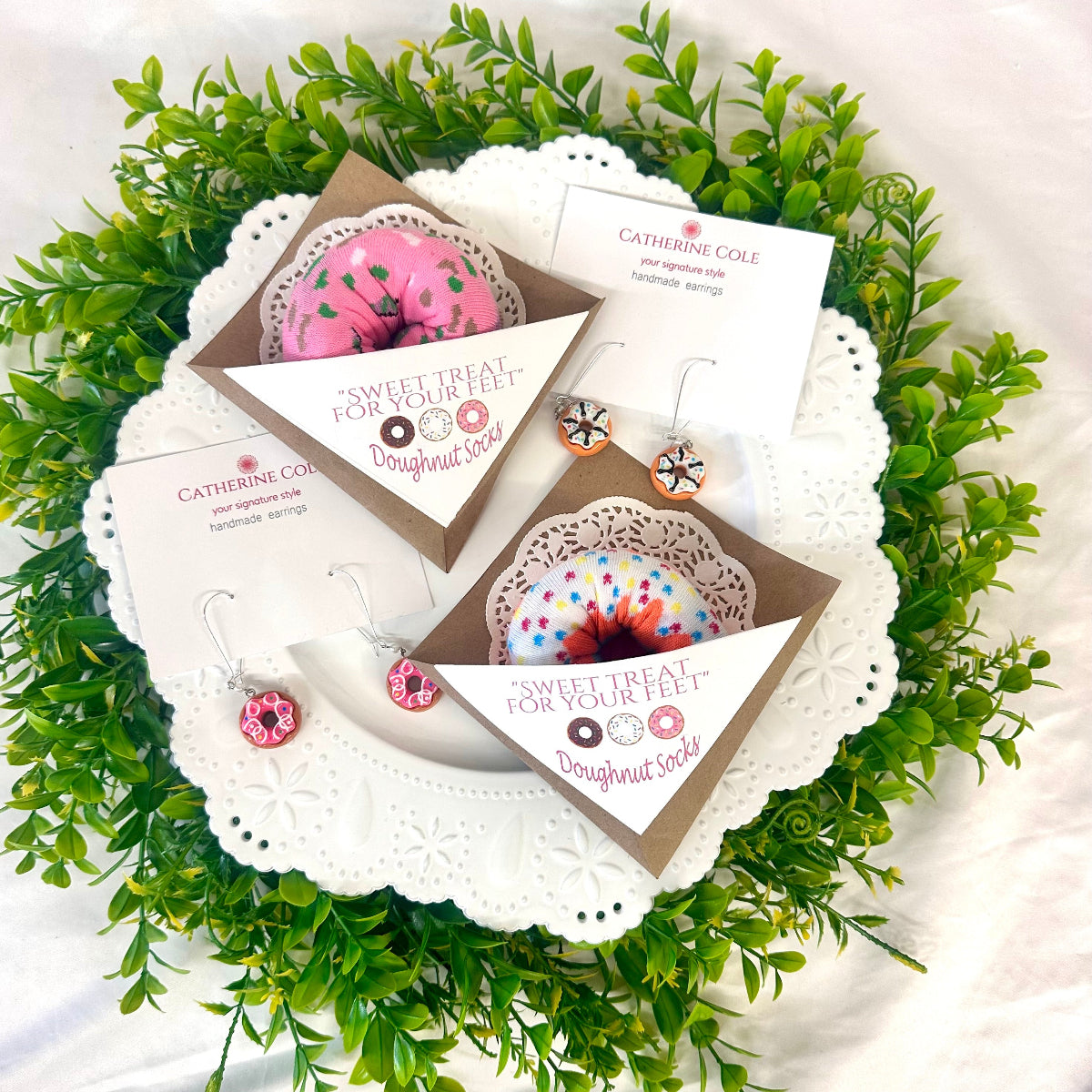 Assorted colorful doughnut socks and matching earrings showing full variety – novelty gift set

