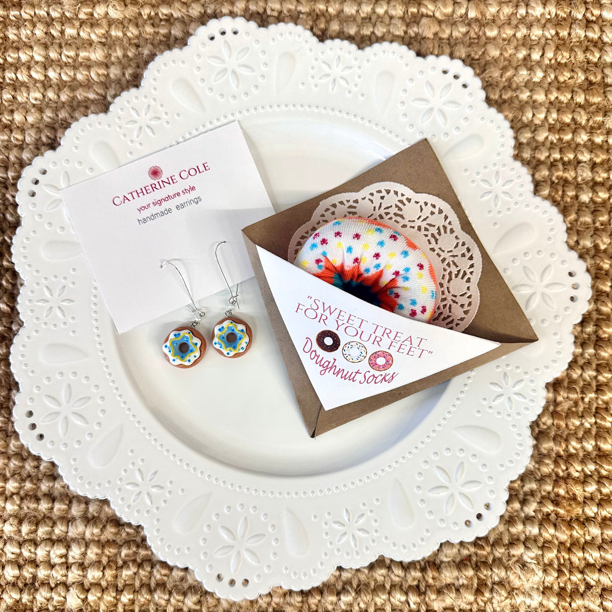 Colorful doughnut sock gift set on white lace plate with earrings – sweet treat for your feet