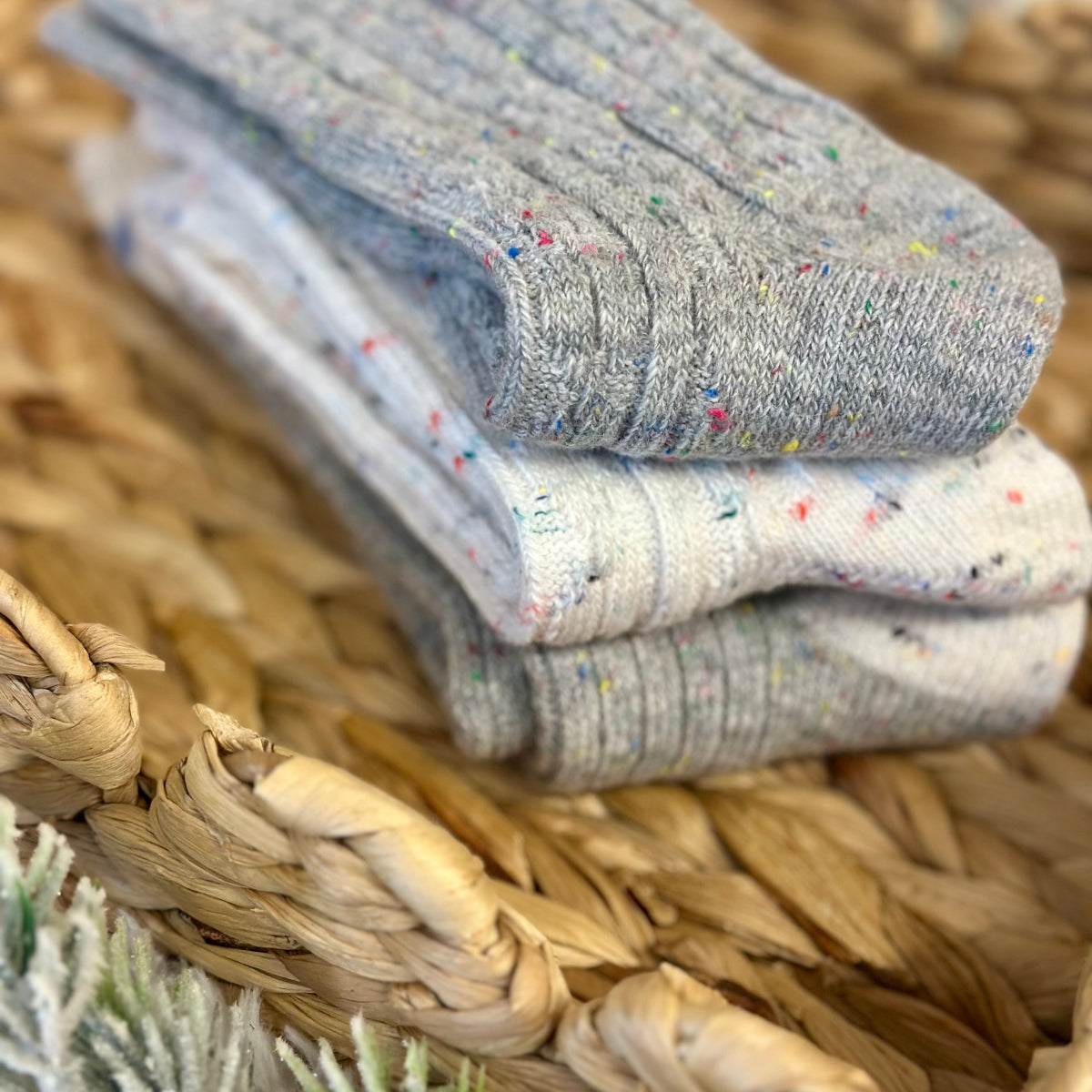 Stack of gray socks with colorful speckles in a woven basket, Cozy grey mix patterned socks - 3 pair gift set + wish bracelet