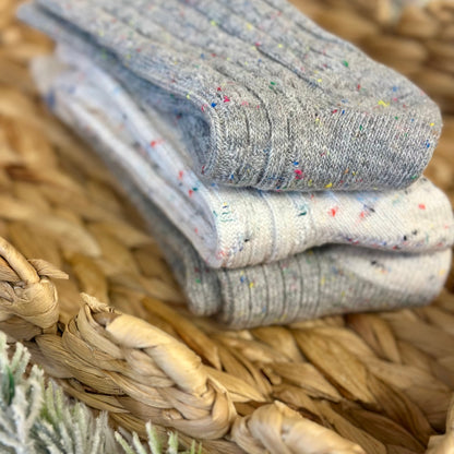 Stack of gray socks with colorful speckles in a woven basket, Cozy grey mix patterned socks - 3 pair gift set + wish bracelet