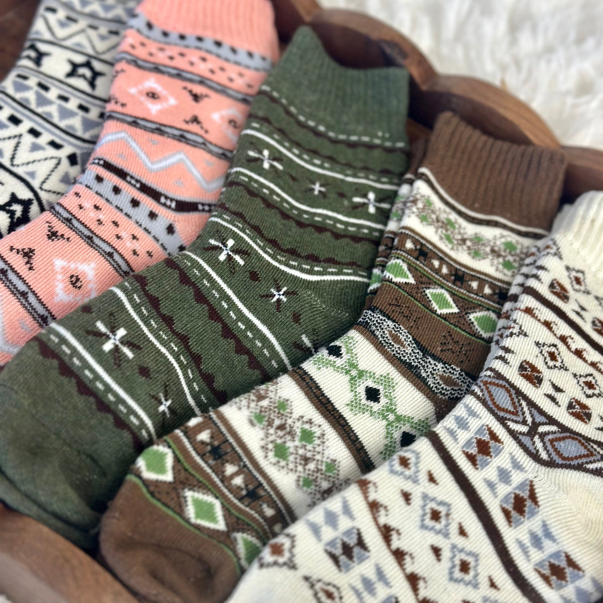 Collection of patterned socks in various colors and designs.  Geometric Patterned Ankle Socks 5-Pack Bundle with Wish Bracelet - Women's