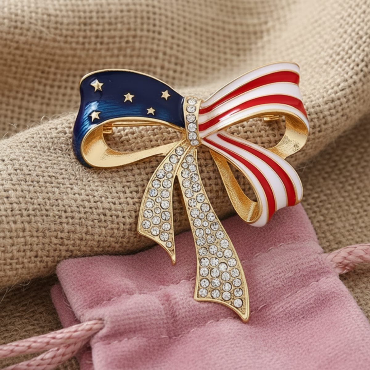 Patriotic_rhinestone_bow_brooch_pin_by_Catherine_Cole_ velvet gift bag by Catherine Cole signature brooches and pins