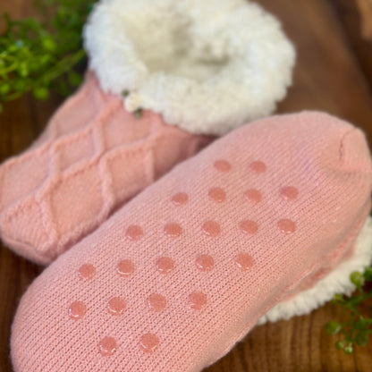 Pair of pink socks with textured sole on a wooden surface  
Pretty in Pink Slipper Sock Gift Set - Grip Bottom + Floral Socks + Wish Bracelet
