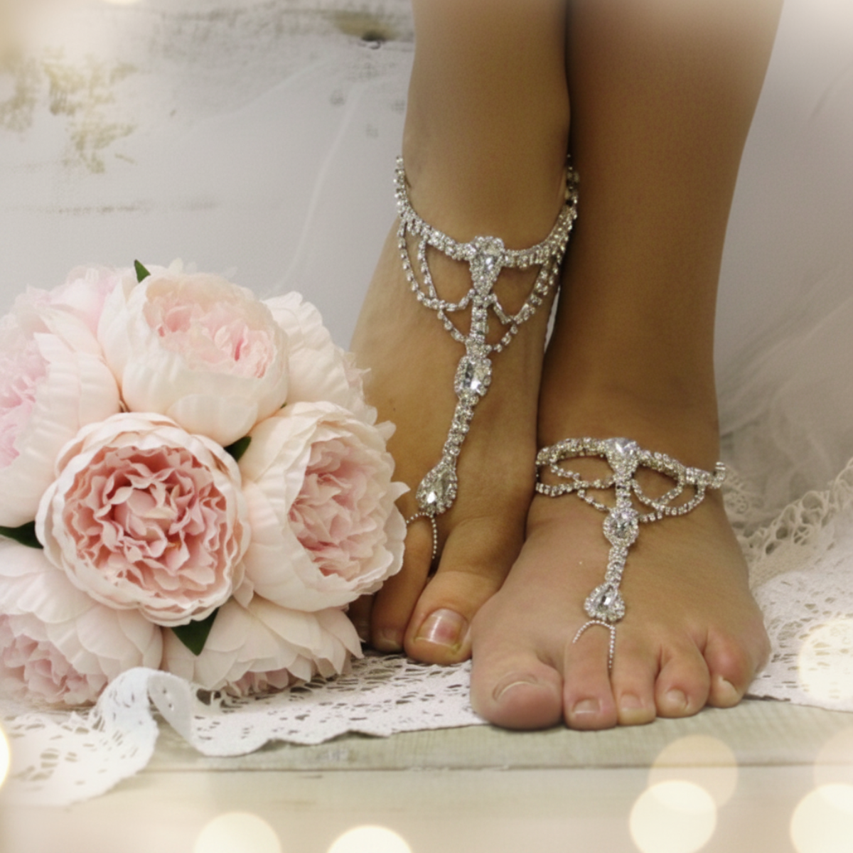 silver foot jewelry for beach weddings by Catherine cole