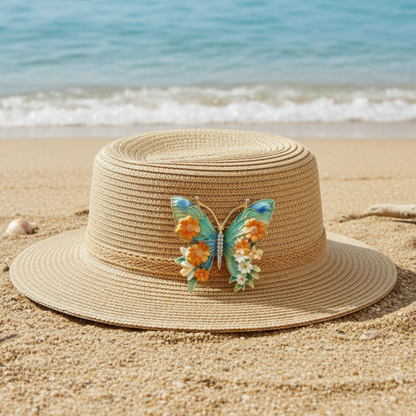 Beige straw hat with a decorative butterfly and floral design on a light background