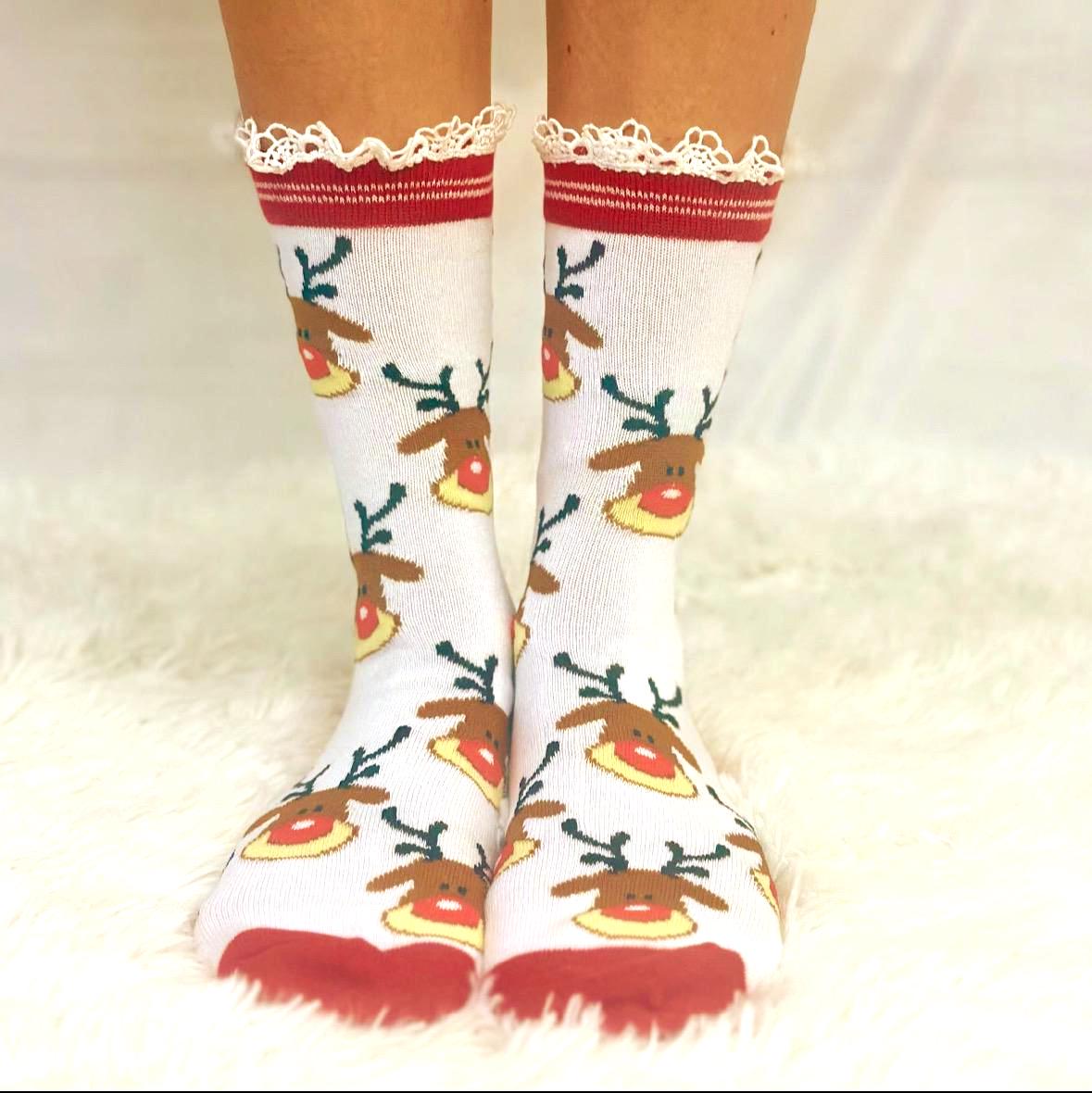 Red reindeer lace topped socks with Rudolph design"
"RUDOLPH Christmas socks with natural cotton lace trim"
"Festive red holiday socks with reindeer pattern close-up"